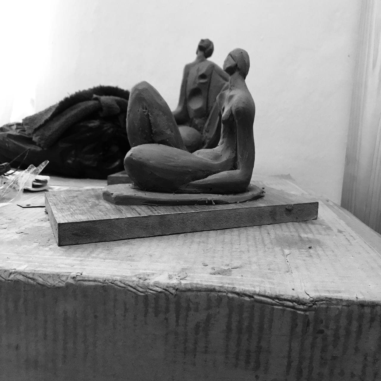 Two Seated Figures, view across the pair